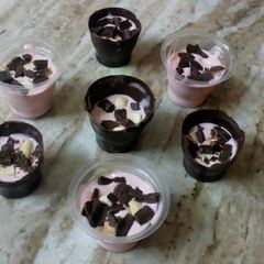 A picture of Chocolate cups and Strawberry Mousse.