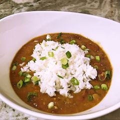 A picture of Red beans and rice with smoked sausage.