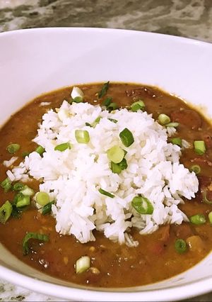 A picture of Red beans and rice with smoked sausage.