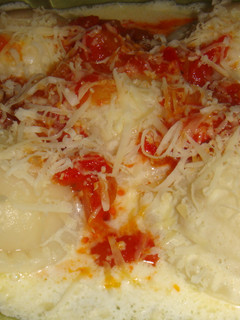 Una foto de Sorrentinos de ricota, mozzarella y jamón