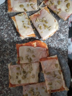 Una foto de Pizza con muzzarella