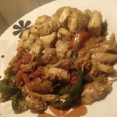 A picture of Stir fried chicken with tofu.