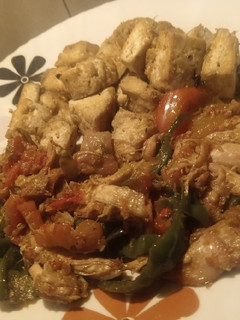 A picture of Stir fried chicken with tofu.