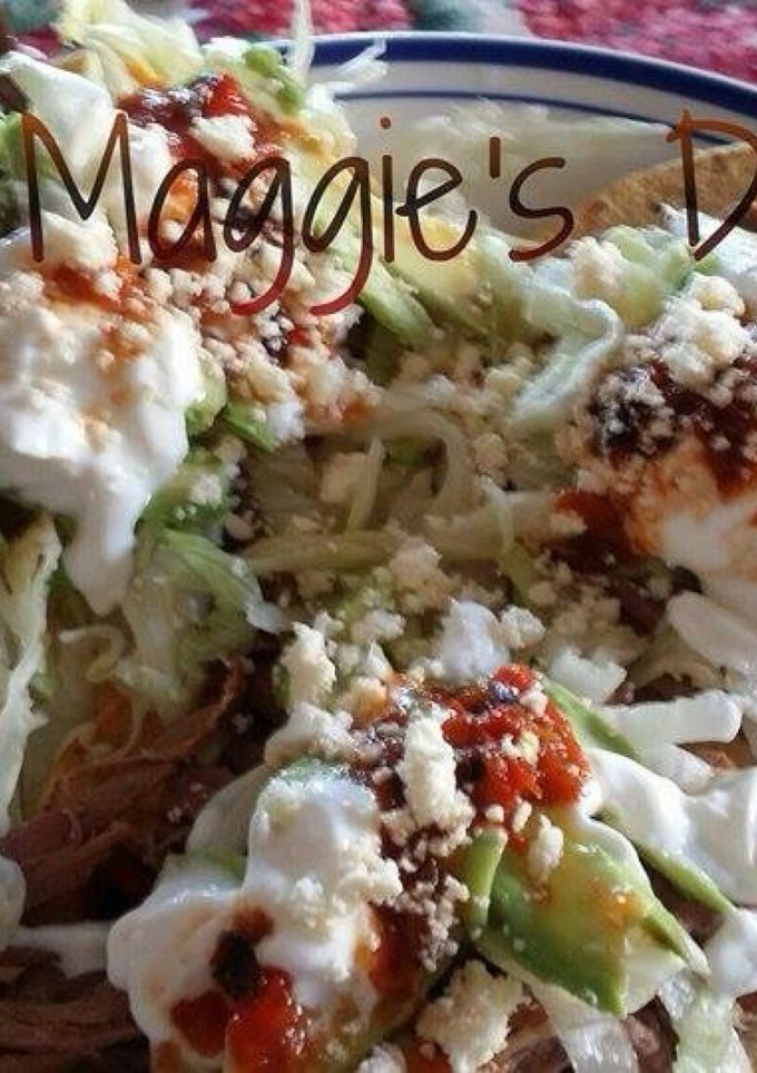 Una foto de Tostadas de carne deshebrada