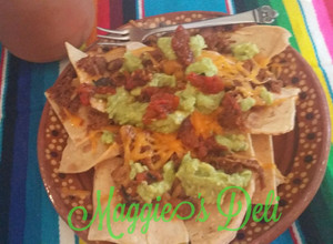 Una foto de Nachos con chilorio