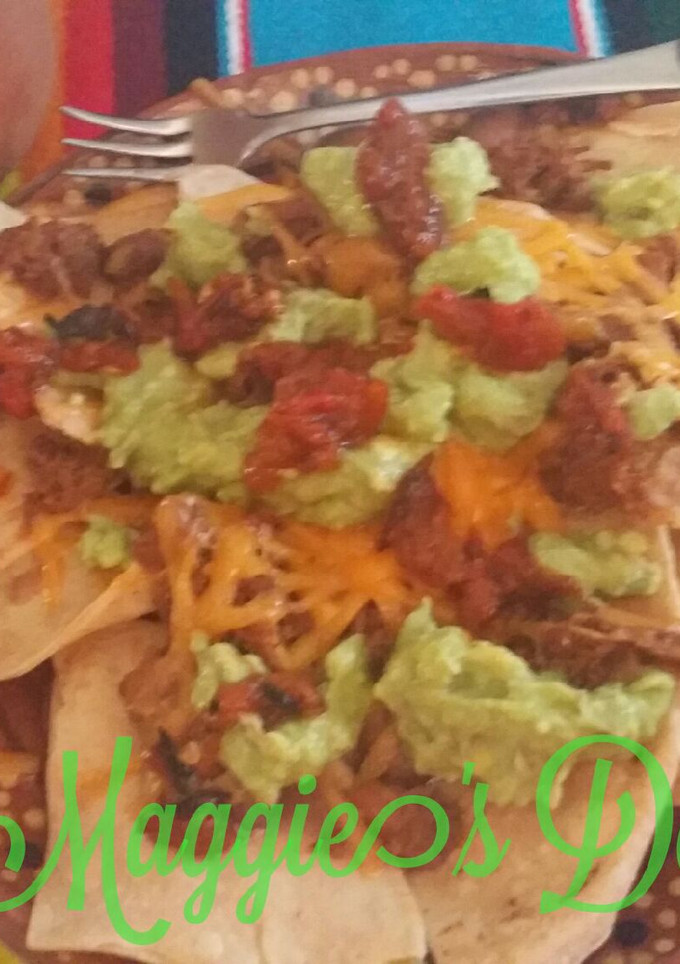 Una foto de Nachos con chilorio