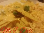Una foto de queso crema cheddar