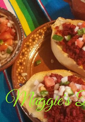 A picture of Molletes with Chorizo.