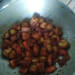 A picture of Potatoes and parwal/ pointed gourd sauteed.