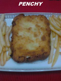 Una foto de Delicias de lomo envueltas en salsa bechamel