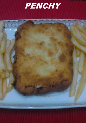 Una foto de Delicias de lomo envueltas en salsa bechamel