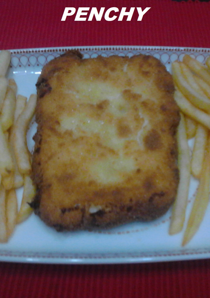 Una foto de Delicias de lomo envueltas en salsa bechamel
