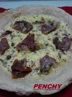 Una foto de Quiche con jamón de Parma al aceite de orégano
