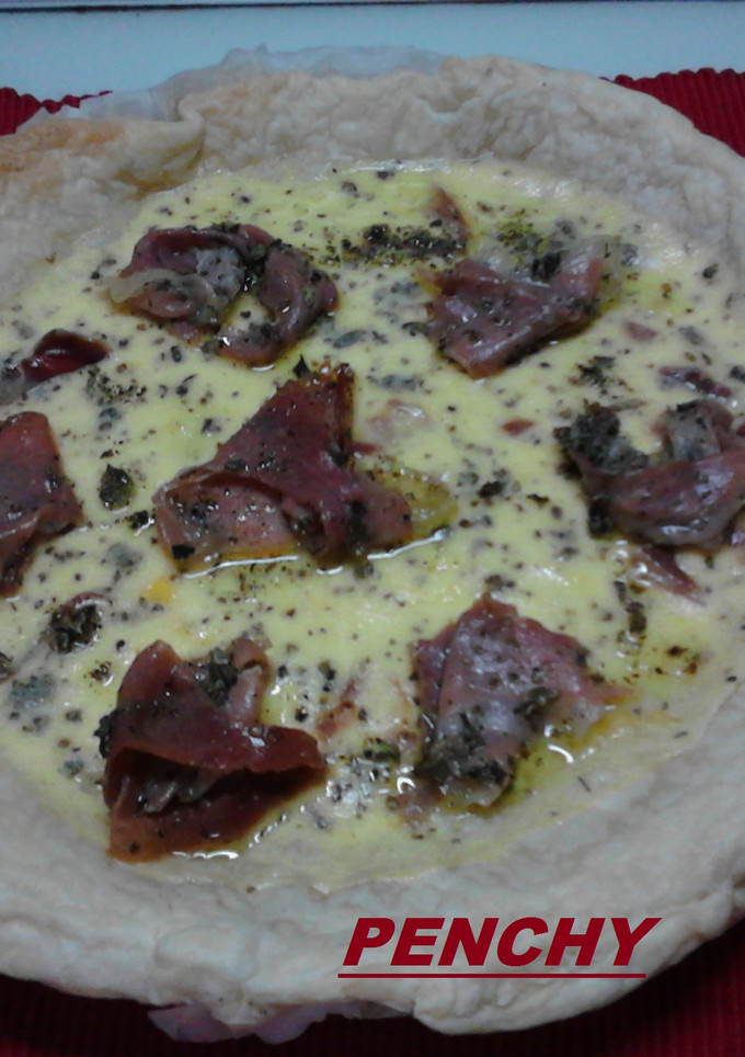 Una foto de Quiche con jamón de Parma al aceite de orégano