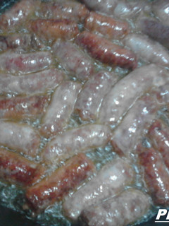 Una foto de Longaniza con vino a la canela