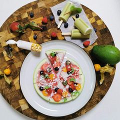 Kids Avo pops, Fruit pizza & Gronola bar (picky Eater kid meal) A picture of Kids Avo pops, Fruit pizza & Gronola bar (picky Eater kid meal).