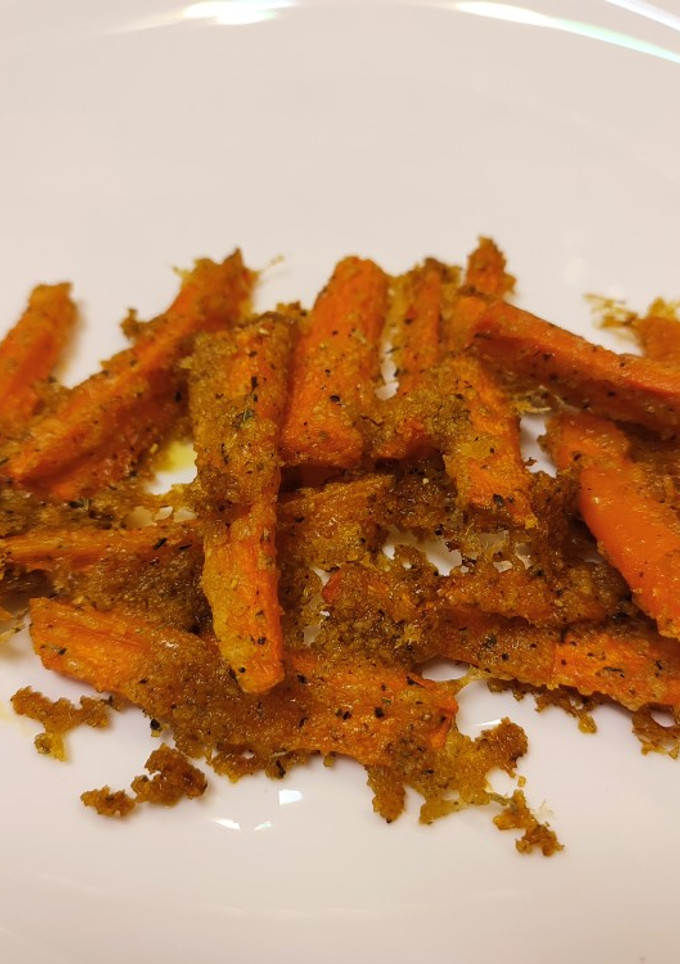 Una foto de Zanahorias crujientes aliñadas al horno