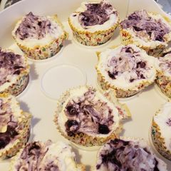 A picture of Lemon blueberry cheesecakes.