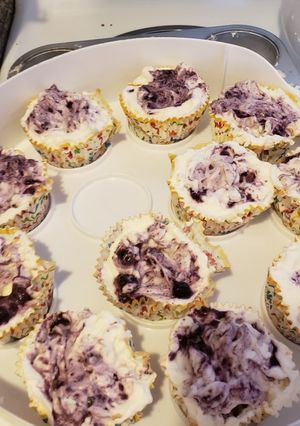A picture of Lemon blueberry cheesecakes.