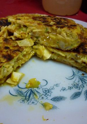 Una foto de Tortilla de tallarines y arroz