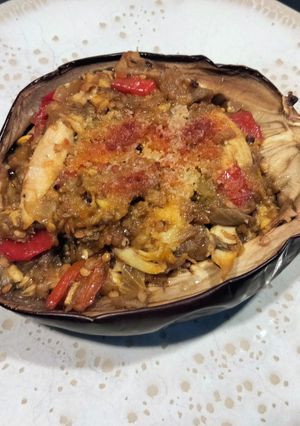 Una foto de Berenjena rellena de pollo