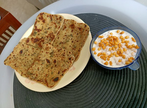 A picture of Lauki Paratha with Boondi ka Raita.