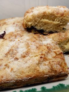 Una foto de Pastel de arándanos y pistachos