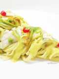 Linguine con dentice, fiori di zucca e crema di peperone
