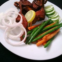 Fried Quail With Butter Tossed Herb Veggies A picture of Fried Quail With Butter Tossed Herb Veggies.