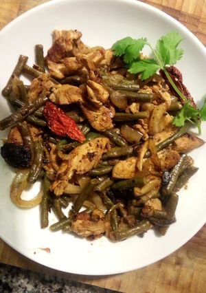 A picture of Chicken Stir-fried with Vegetables and Sun-dried Tomatoes.