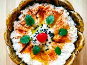 Una foto de pasta con hummus