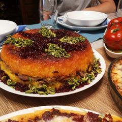 A picture of Chicken stuffed rice(tah-chin morgh).