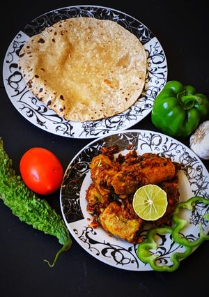 A picture of Stuff karela with multigrain chapati.