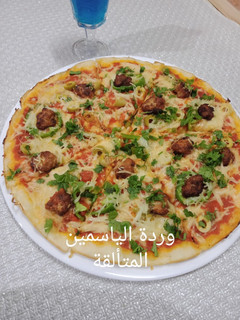 صورة لوصفة بيتزا بالاعشاب وكريات الدجاج على طريقتي