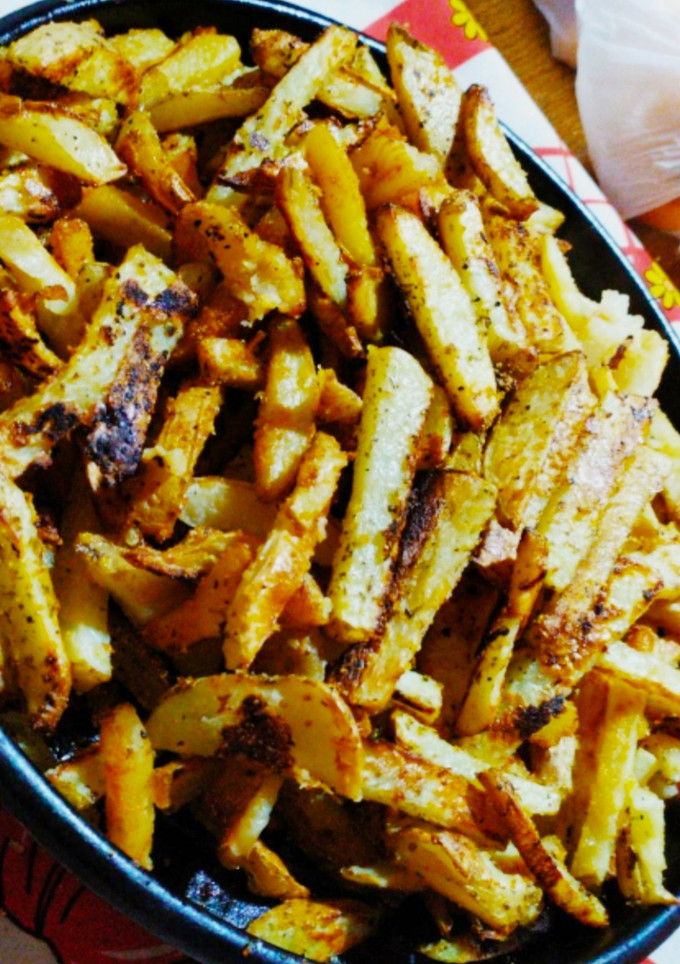 Una foto de Papas rústicas saborizadas al horno