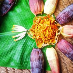 A picture of Banana flower with mustard paste.