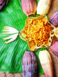A picture of Banana flower with mustard paste.