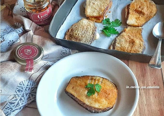 Medaglioni di melanzane con paté di pomodori secchi e provolone