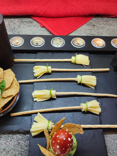 Una foto de Escobas de bruja de queso