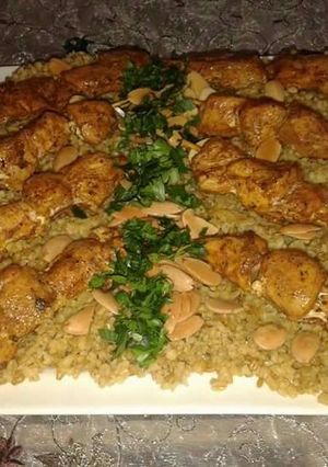 صورة لوصفة فريكة مع أسياخ الدجاج