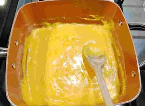 Una foto de Salsa de queso cheddar