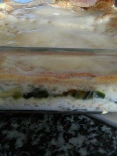 Una foto de Lasaña de espinacas y queso