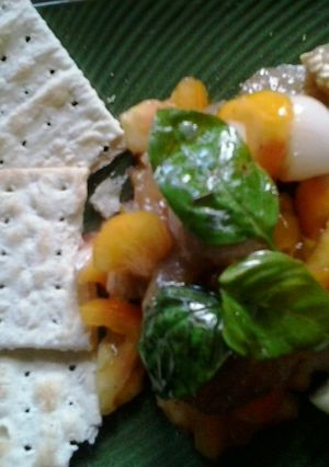 Una foto de Berenjenas al escabeche con tomates y cebollitas