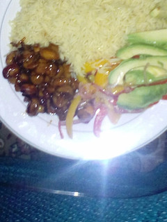 A picture of Rice, mushrooms and avocado.