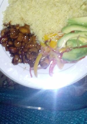 A picture of Rice, mushrooms and avocado.