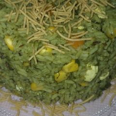 A picture of Corn palak paneer rice.