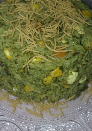 A picture of Corn palak paneer rice.