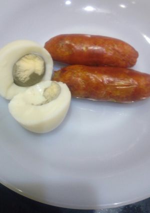 A picture of Boiled, (grilled)sausages and boiled egg.