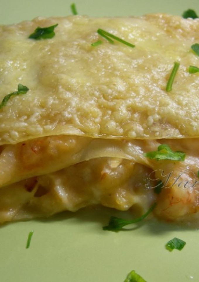 Una foto de Lasaña de bacalao y gambas