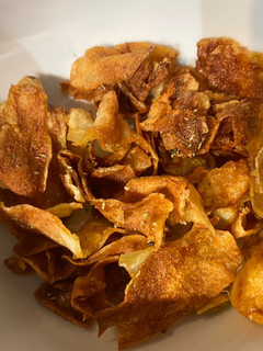 A picture of Homemade potato crisps.
